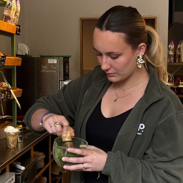 Server preparing a Matcha in Pipp & Co Cafe in Bristol